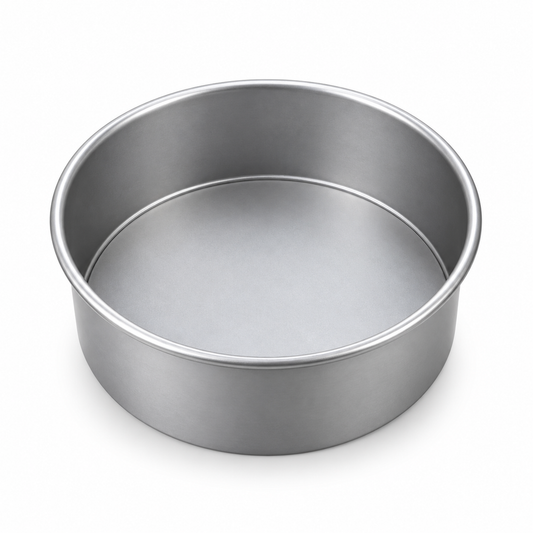 Molde redondo de aluminio con fondo desmontable de 15 cm de diámetro y 7 cm de alto sobre fondo blanco